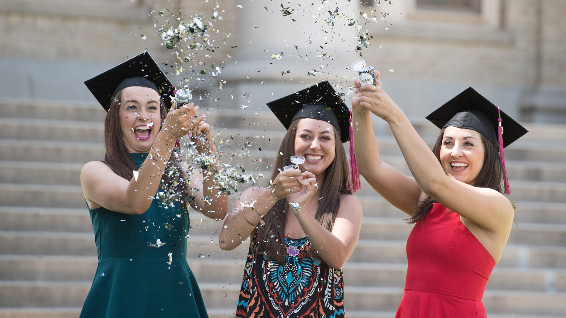 Several CSU students celebrating graduation