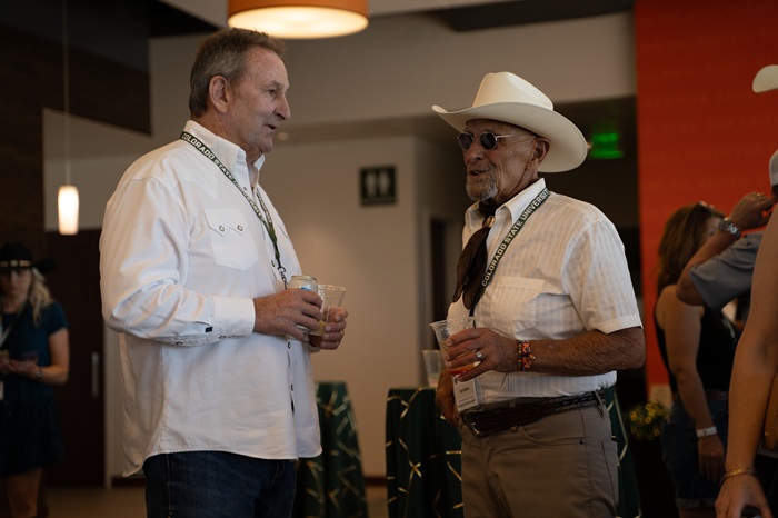Participants enjoy the camaraderie at the 1870 Exclusive
